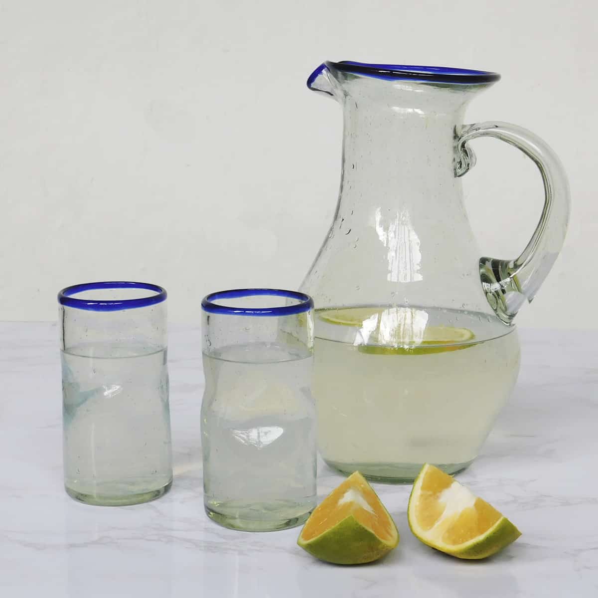 Blue Rim Hand Blown Glasses and Pitcher