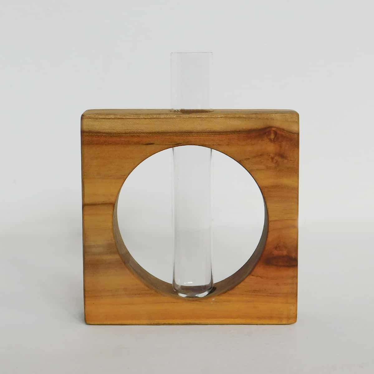 a square teak frame with a circle cut out and space for a tube vase