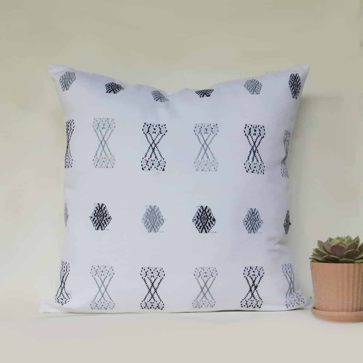 White Cucanja Throw Pillow